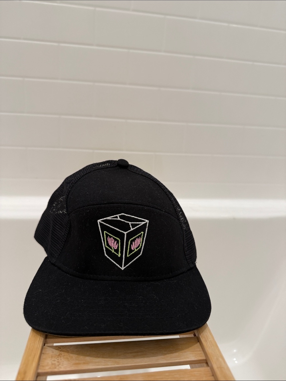 Black Mesh Trucker Hat with Pink Floral Cube Embroidery